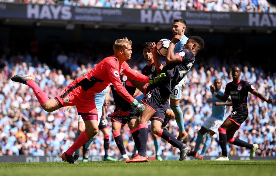 Huddersfield defended valiantly to earn a 0-0 draw against champions Manchester City.