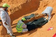 Libyan investigators find more mass graves in recaptured city