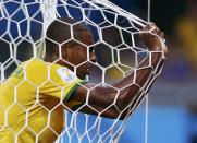 Brazil's Fernandinho reacts in his goal's net after they conceded a goal to Germany during their 2014 World Cup semi-finals at the Mineirao stadium in Belo Horizonte July 8, 2014. REUTERS/Marcos Brindicci