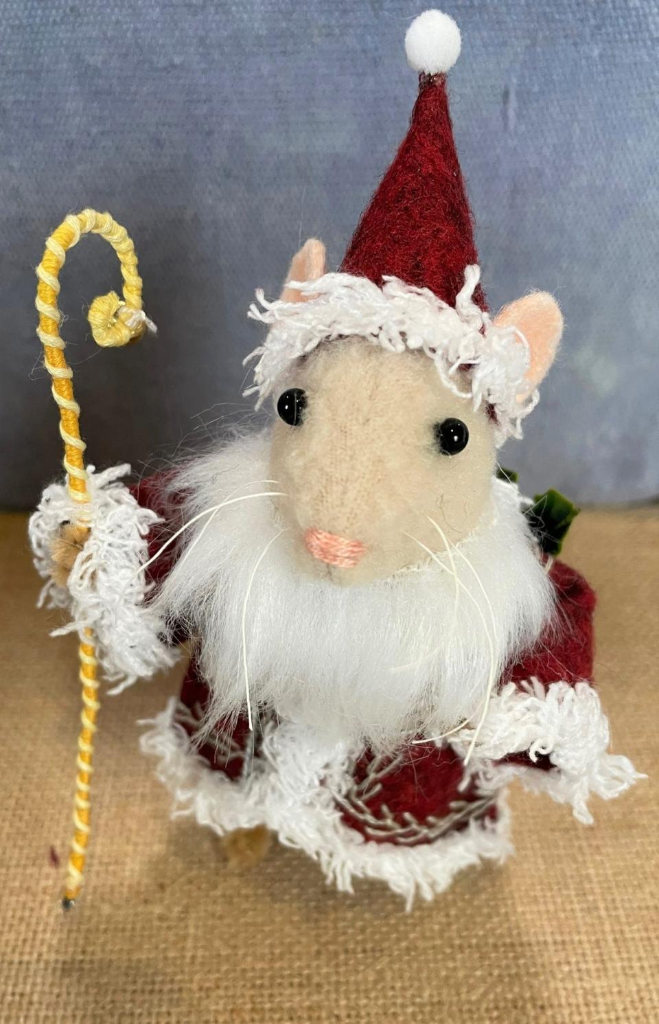 Christmas Mouse by Monique Cagle is one of her handcrafted fabric animals.