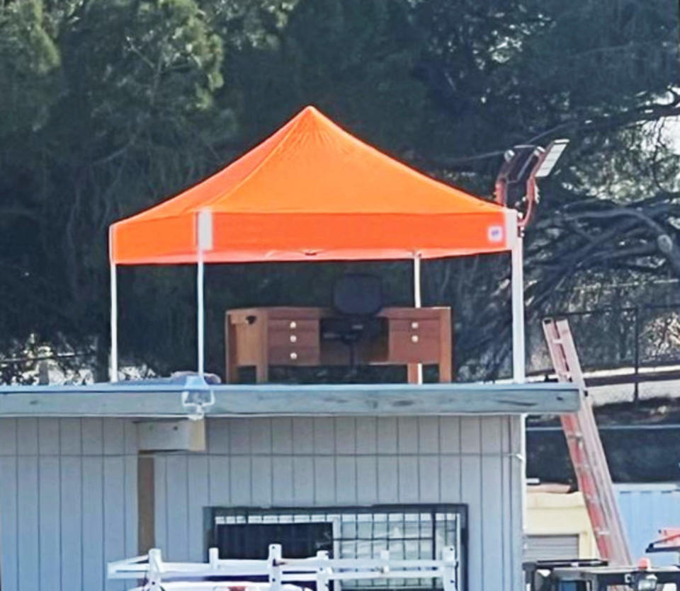 Jim Kesser’s desk to a roof in AUSD’s maintenance yard where Kesser works. (via KNTV)