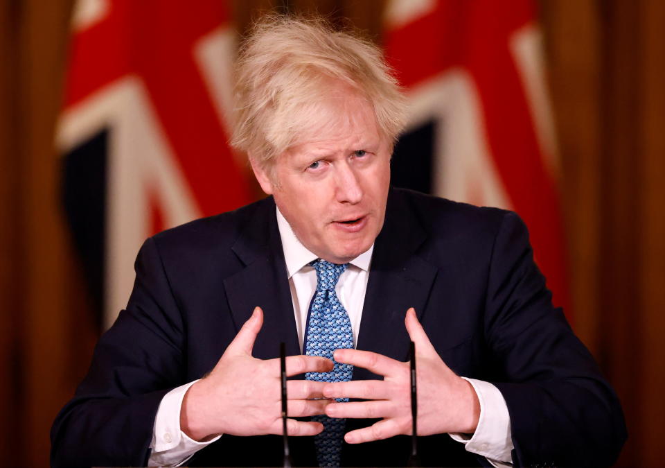 Britain's Prime Minister Boris Johnson speaks during a virtual news conference, after chairing a COBRA meeting, which was called in response to increased travel restrictions amid the coronavirus disease (COVID-19) pandemic, at 10 Downing Street, in London, Britain, December 21, 2020. (Tolga Akmen/Pool via Reuters)