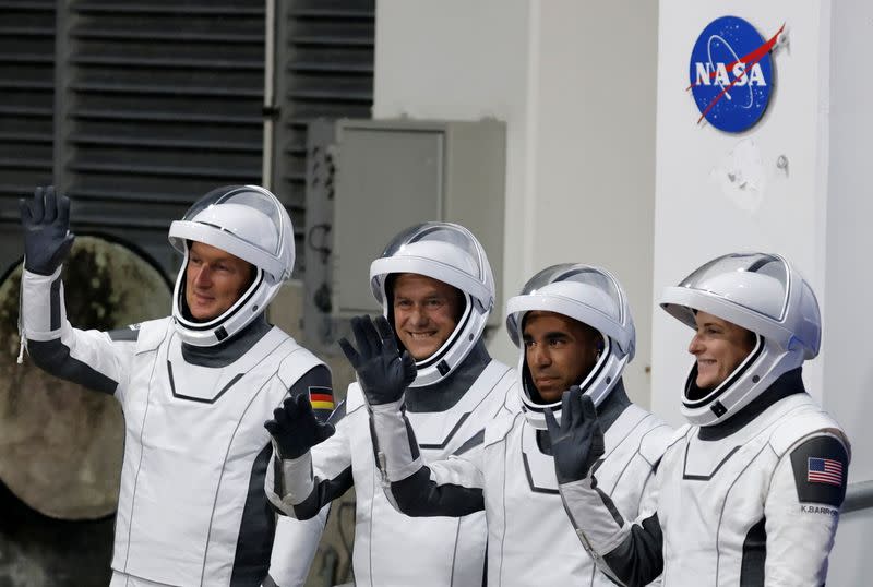 FILE PHOTO: NASA astronauts depart their crew quarters for launch aboard a SpaceX Falcon 9 rocket in Cape Canaveral