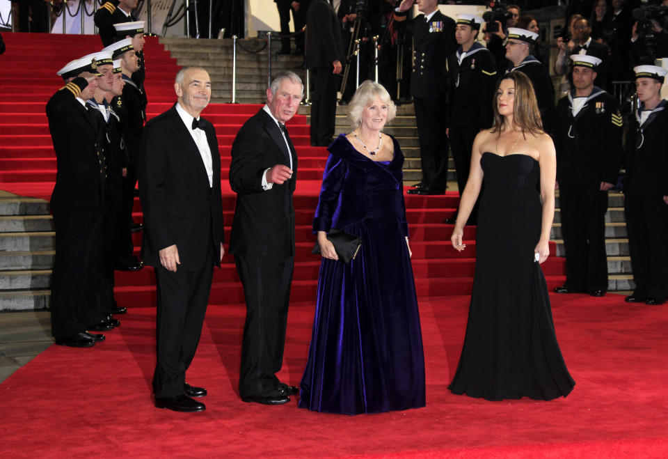 Michael G. Wilson, from left, Prince Charles, Camilla Parker-Bowels and Barbara Broccoli arrive at the world premiere of "Skyfall" at the Royal Albert Hall on Tuesday, Oct. 23, 2012 in London. (Photo by Joel Ryan/Invision/AP)