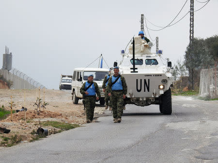 UN peacekeepers (UNIFIL) patrol the border with Israel near the village of Kfar Kila, Lebanon December 4, 2018. REUTERS/Ali Hashisho/File Photo