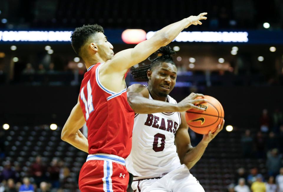 Bradley forward Malevy Leons shuts down Missouri State guard Chance Moore during the Braves 86-62 victory in a Missouri Valley Conference game at Great Southern Bank Arena in Springfield, Mo., on Wednesday, Feb. 21, 2024.