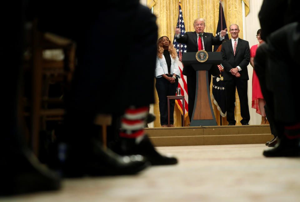 U.S. President Donald Trump holds a news conference to mark six months since the passage of the Tax Cuts and Jobs Act, in the White House East Room in Washington, U.S., June 29, 2018. REUTERS/Kevin Lamarque