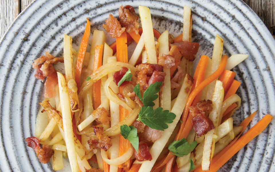 <p>Clare Barboza/Bonnie Matthews</p><p><strong>Get the recipe here: <a href="/1100096/parade/bacon-touched-carrots-turnips/" data-ylk="slk:Bacon-Touched Carrots and Turnips;elm:context_link;itc:0;sec:content-canvas" class="link ">Bacon-Touched Carrots and Turnips</a></strong></p><p><strong>Related: <a href="https://www.yahoo.com/lifestyle/40-veggie-forward-recipes-youll-143455920.html" data-ylk="slk:40 Best Spring Vegetables Dishes and Recipes;elm:context_link;itc:0;sec:content-canvas;outcm:mb_qualified_link;_E:mb_qualified_link;ct:story;" class="link  yahoo-link">40 Best Spring Vegetables Dishes and Recipes</a></strong></p>
