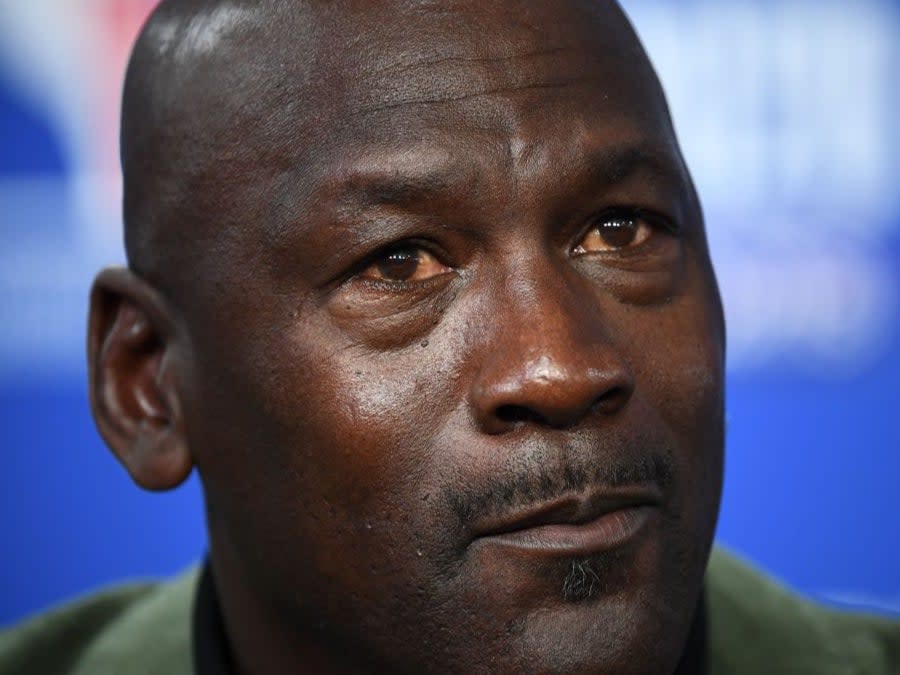 Michael Jordan is venturing into motor racingAFP