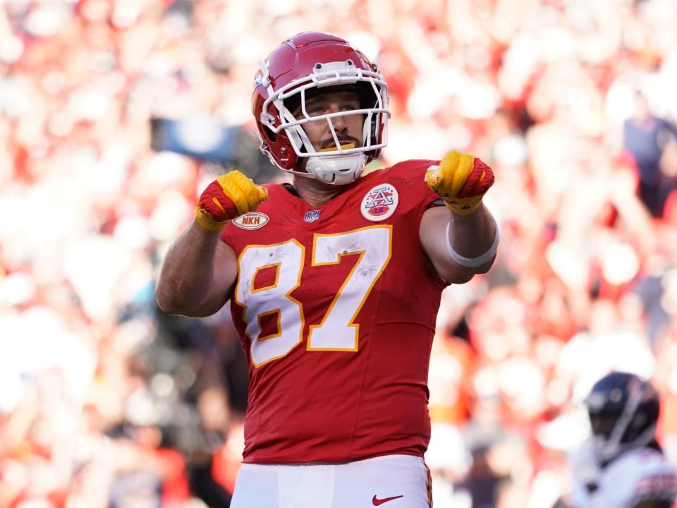 Travis Kelce celebrates after scoring a touchdown against the Chicago Bears.