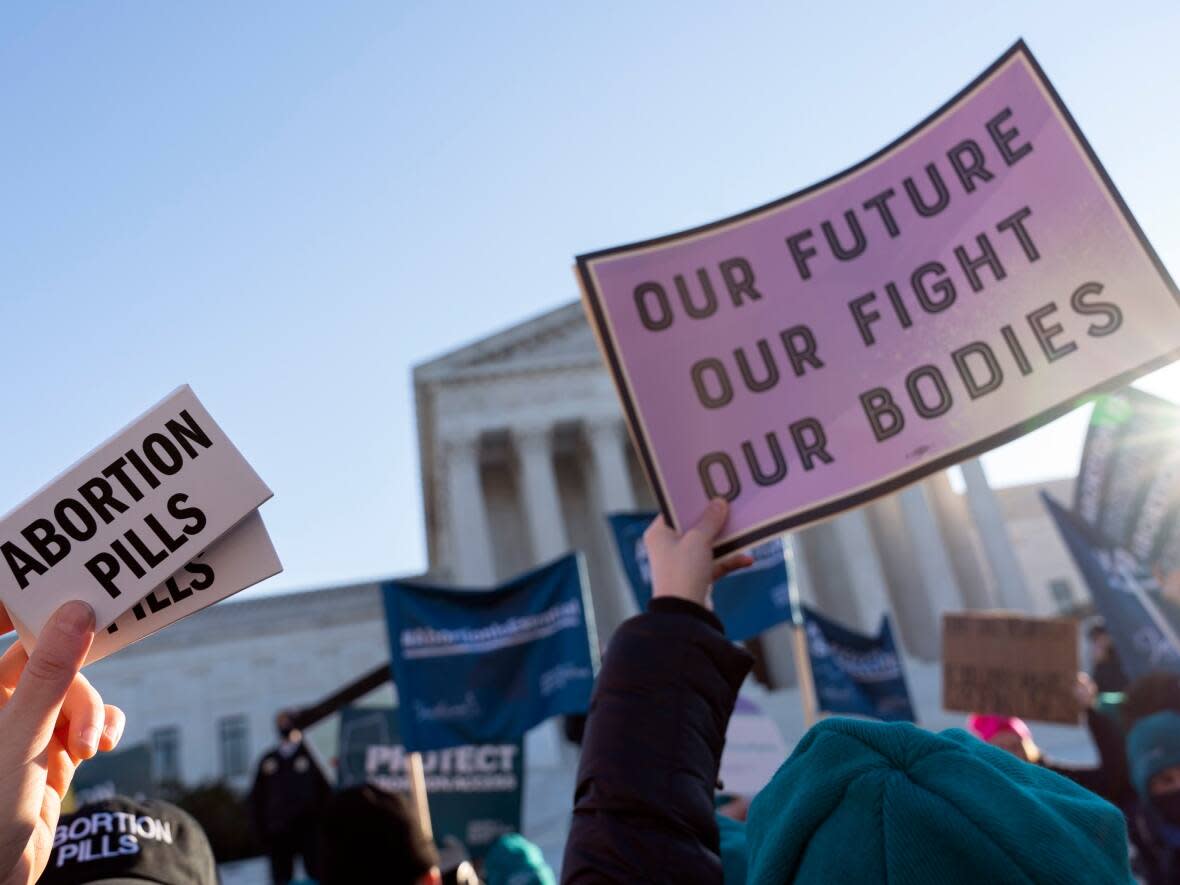 Abortion rights advocates demonstrate in front of the U.S. Supreme Court in Washington. (Jose Luis Magana/The Associated Press - image credit)