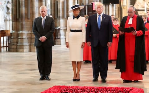 Prince Andrew, Duke of York (left) with US President Donald Trump and First Lady Melania Trump at the Grave of the Unknown Warrior - Credit: Chris Jackson