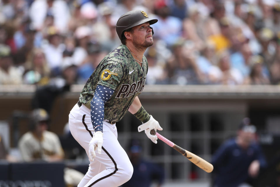 San Diego Padres' Luke Voit watches his RBI-single against the Minnesota Twins in the sixth inning of a baseball game Sunday, July 31, 2022, in San Diego. (AP Photo/Derrick Tuskan)
