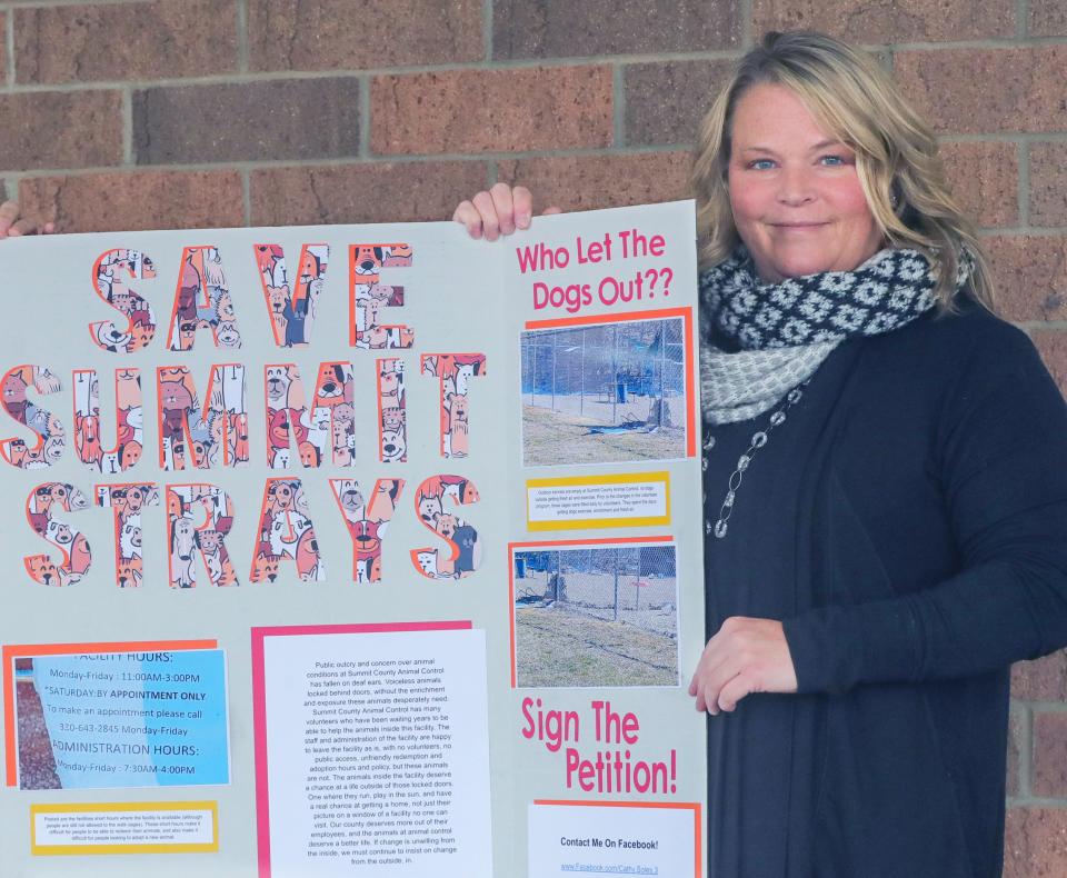 Jody Owen helps gather signatures last month for a ballot measure to change the way Summit County Animal Control operates.