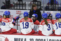 Czechia coach Carla MacLeod, top, gives instruction to players during the third period of a semifinal against Canada at the women's world hockey championships in Utica, N.Y., Saturday, April 13, 2024. (AP Photo/Adrian Kraus)