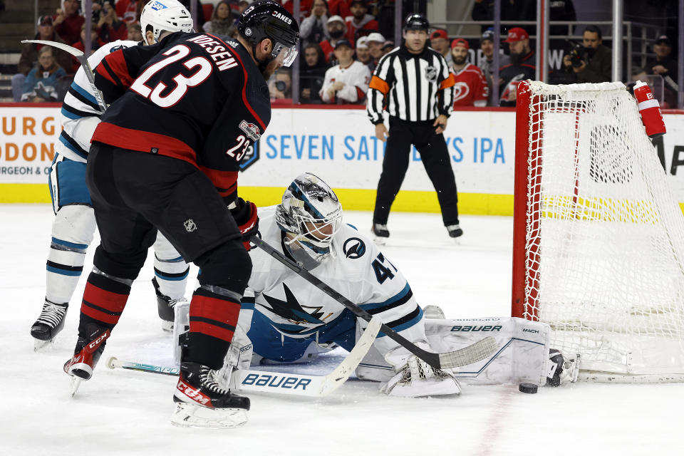 San Jose Sharks goaltender James Reimer (47) blocks a shot by Carolina Hurricanes' Stefan Noesen (23) during the second period of an NHL hockey game in Raleigh, N.C., Friday, Jan. 27, 2023. (AP Photo/Karl B DeBlaker)