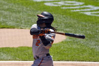 Baltimore Orioles' Freddy Galvis (2) hits a home run during the first inning in the first baseball game of a doubleheader against the Chicago White Sox, Saturday, May 29, 2021, in Chicago. (AP Photo/Matt Marton)