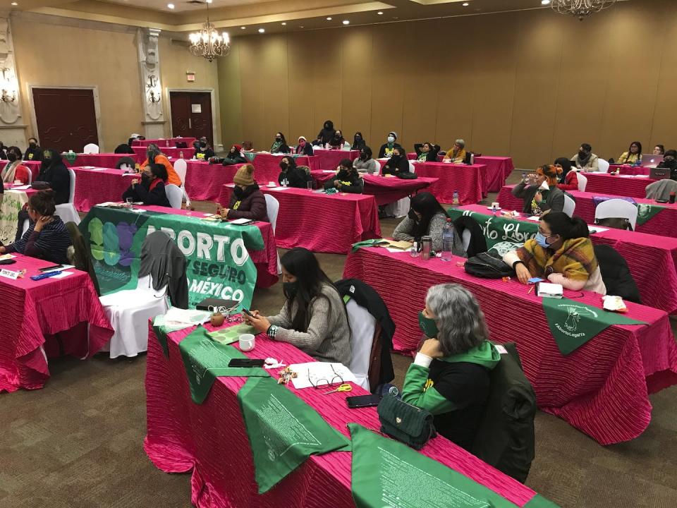 Mexican and U.S. abortion advocates gather in Matamoros, Mexico to discuss their co-ordinated efforts to support women in the U.S. seeking abortion services under increasingly restrictive state laws in January 2022. (AP Photo/Maria Verza)