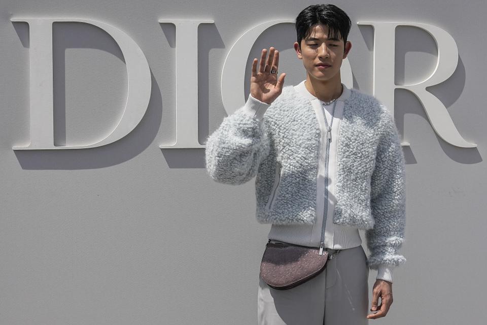 Park Solomon poses for photographers upon arrival at the Dior Menswear Spring/Summer 2024 fashion collection presented in Paris, Friday, June 23, 2023. (AP Photo/Michel Euler)