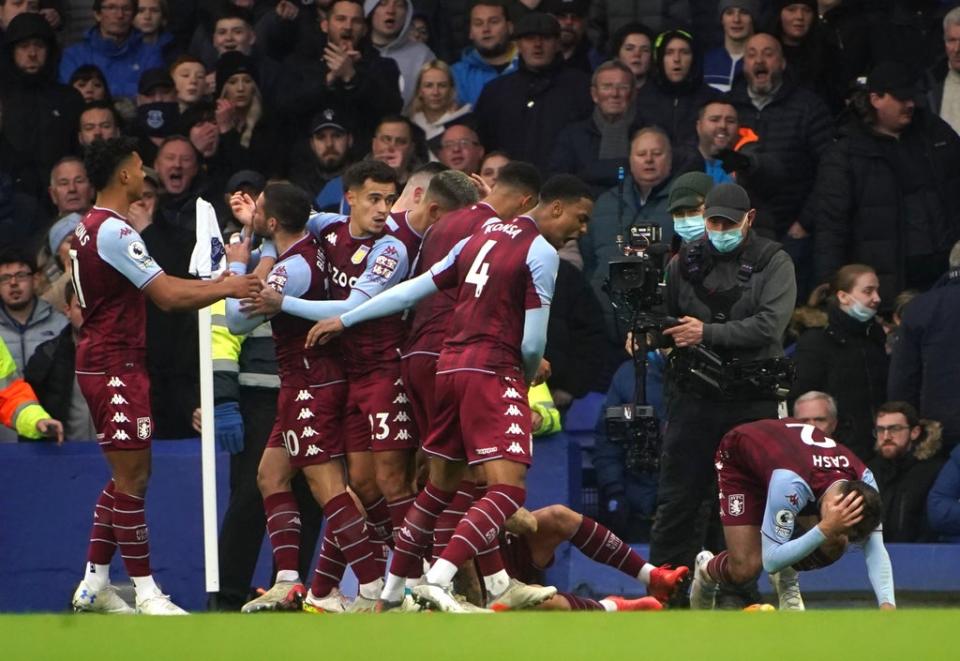 Aston Villa’s Lucas Digne and Matty Cash react to being hit by a missile at Everton (Peter Byrne/PA) (PA Wire)