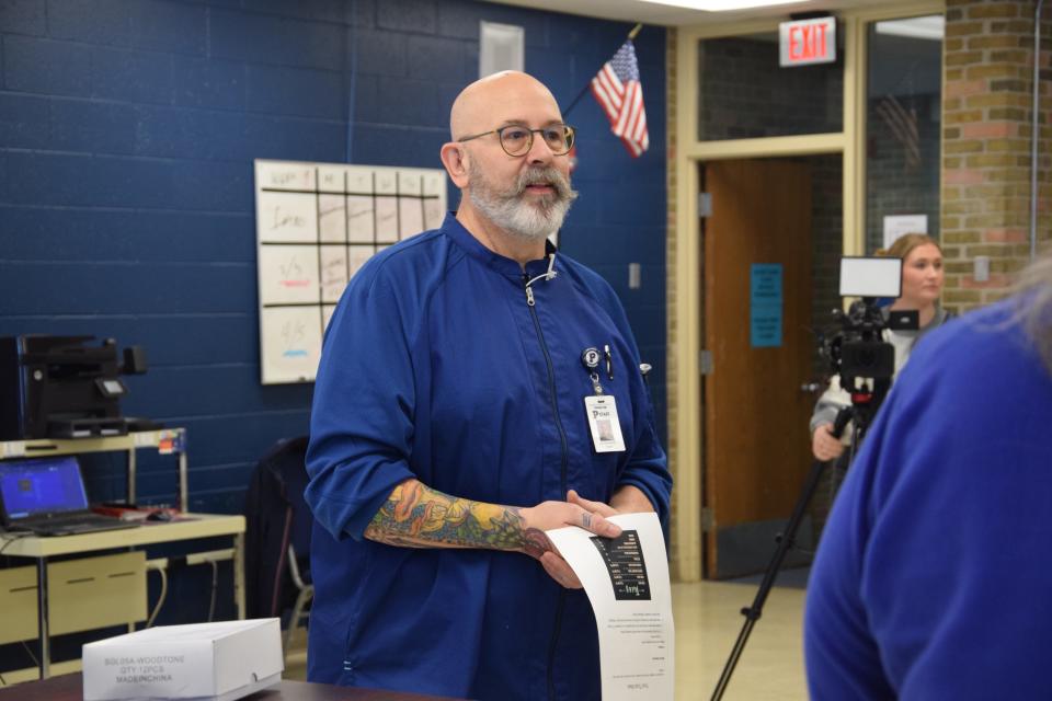 Petoskey culinary instructor Bill Sommerfeldt addresses the crowd about the Food Truck Wars on March 20, 2024 and what students had to prepare for the second annual event.