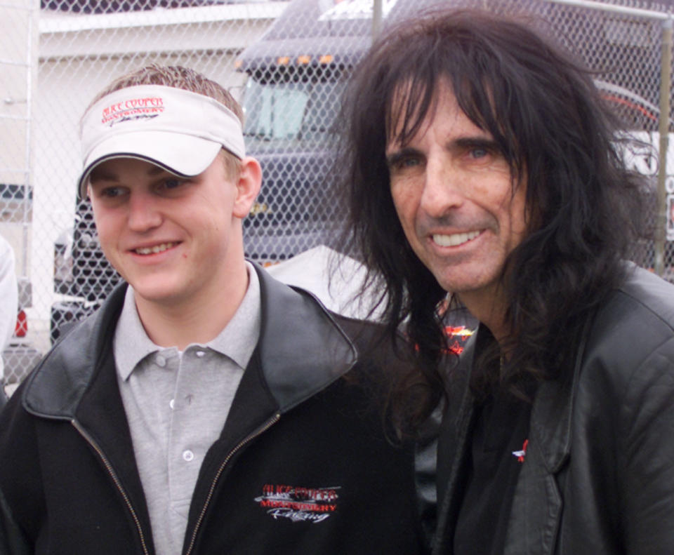 Rock performer Alice Cooper (R) poses for a picture with his driver,
Chase Montgomery in the pits prior to running of the ARCA Re/Max race
at the Daytona International Speedway in Daytona Beach, Florida
February 8, 2003. Montgomery drove the Alice Cooper-Montgomery Racing
Pontiac in the race. The ARCA race is part of events leading to the
running of the 45th Daytona 500, scheduled for February 16.
REUTERS/Charles W Luzier

JLS/ME