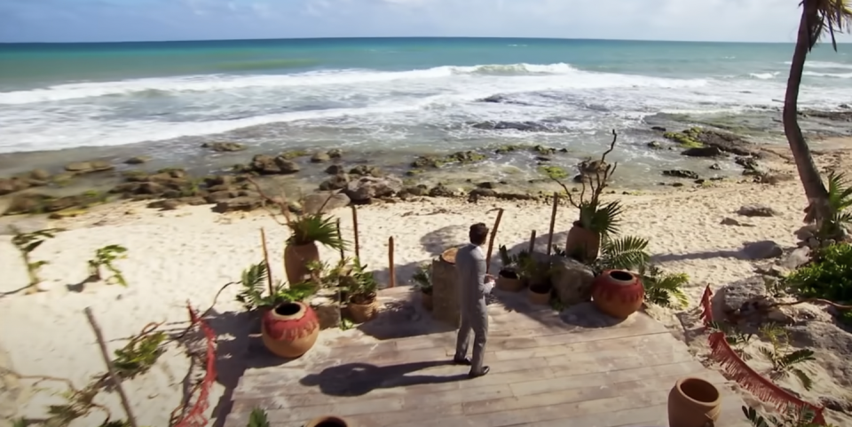 a person walking on a beach