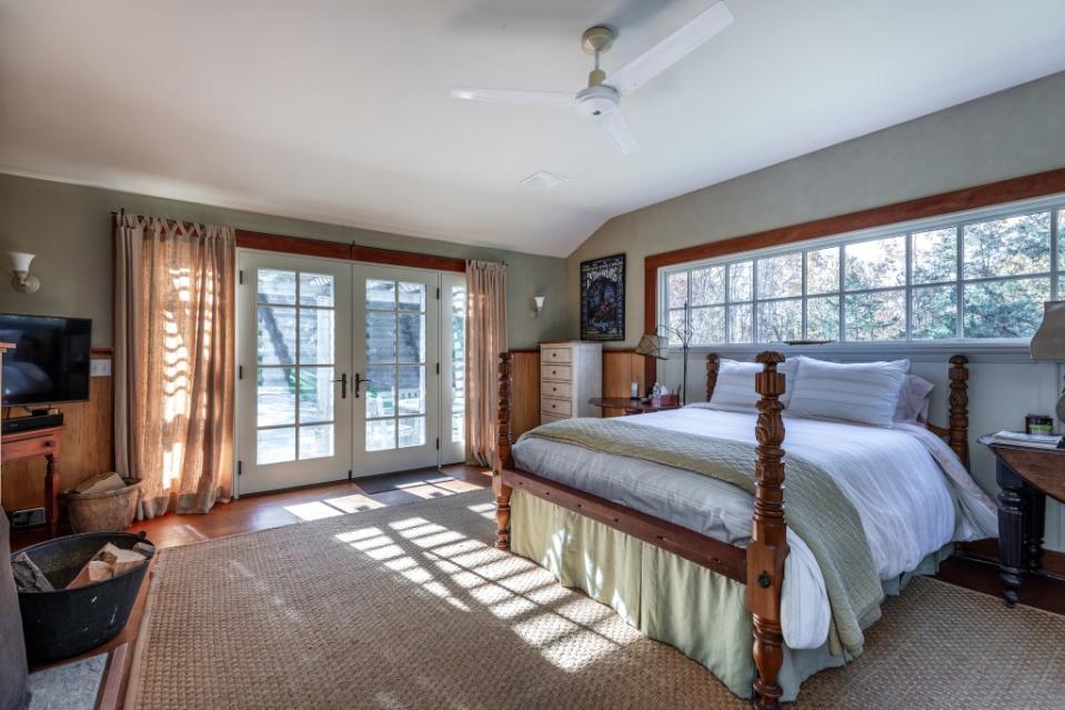 The pool house bedroom. Klemm Real Estate & Michael Bowman Photography