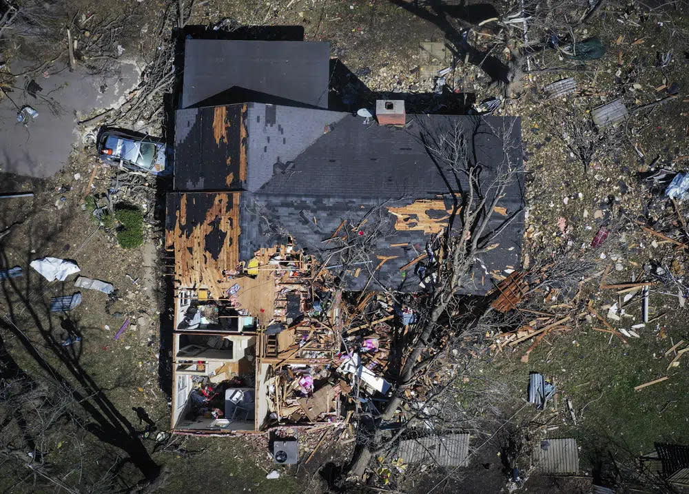 A house is destroyed from a tornado in Covington, Tenn., Saturday, April 1, 2023. (Patrick Lantrip/Daily Memphian via AP)