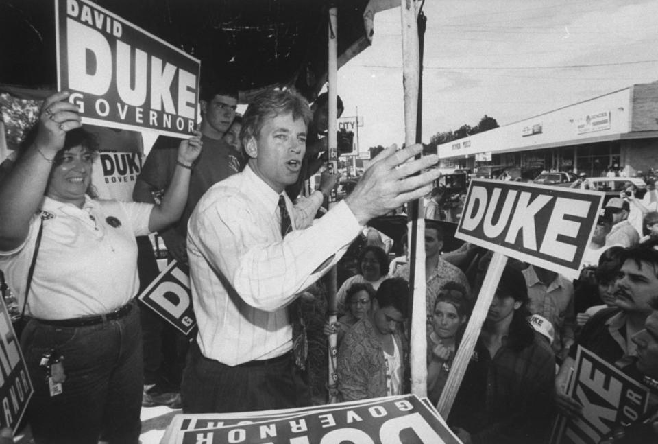 <p>Former grand wizard of Ku Klux Klan David Duke campaigning for LA governor on platform, surrounded by voters w. David Duke signs in 1991. (Photo: Acey Harper/The LIFE Images Collection/Getty Images) </p>