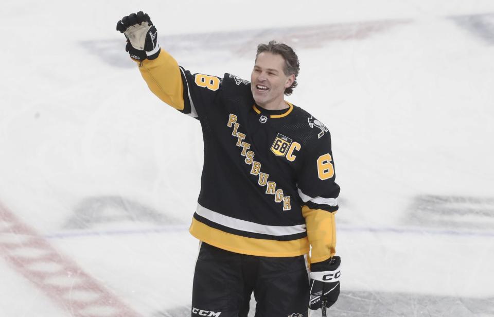 Former Penguins great Jaromir Jagr waves to the crowd during warmups before the Penguins played the Los Angeles Kings at PPG Paints Arena on Feb. 18.