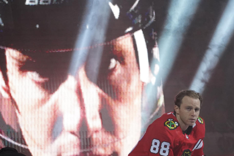 FILE - Chicago Blackhawks right wing Patrick Kane (88) is introduced during opening night of an NHL hockey game against the Detroit Red Wings, Oct. 21, 2022, in Chicago. Kane is signing with the Red Wings, a person with knowledge of the decision tells The Associated Press. Kane is expected to sign a contract for the remainder of the NHL season. The 35-year-old is coming off hip resurfacing surgery done to try to move past a nagging injury. (AP Photo/David Banks, file)