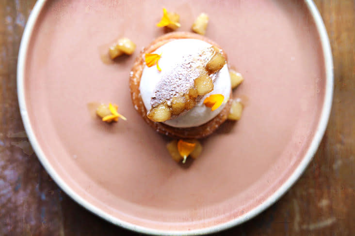 An off menu dessert of 'churros' topped with ice cream.