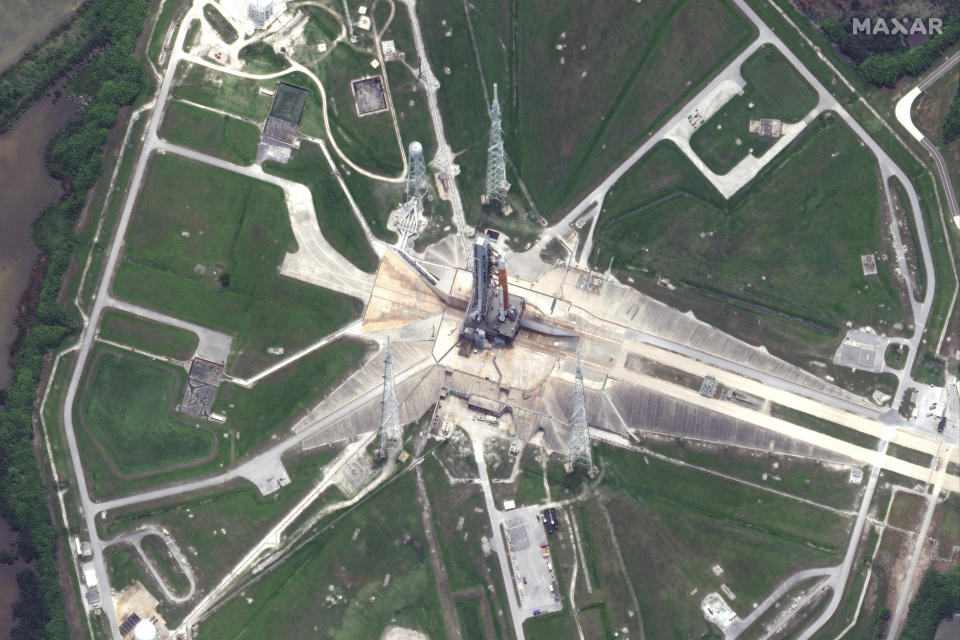 This satellite image provided by Maxar Technologies shows NASA’s Space Launch System (SLS) rocket and and the Orion space capsule on the launch pad at Launch Complex 39B at the Kennedy Space Center in Florida on Saturday, June 18, 2022. (Maxar Technologies via AP)