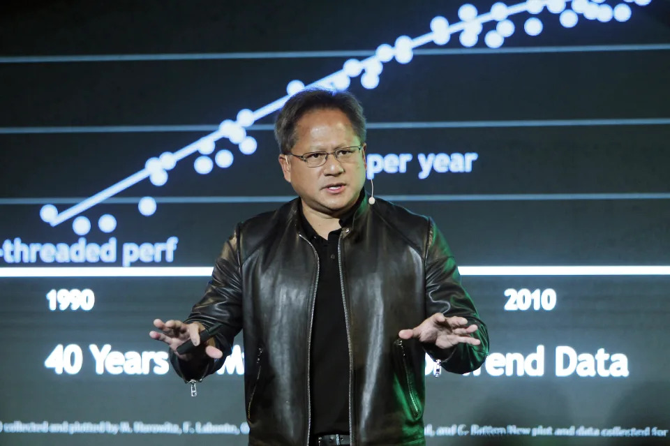 NVIDIA CEO Jen-Hsun Huang delivers a speech about AI and gaming during the Computex Taipei exhibition at the world trade center in Taipei, Taiwan, Tuesday, May 30, 2017. (AP Photo/Chiang Ying-ying)
