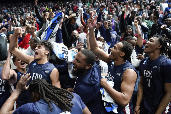 Fairleigh Dickinson players celebrate beating Purdue 63-58 on Friday in the first round of the men&#39;s NCAA tournament in Columbus, Ohio. (AP Photo/Paul Sancya)