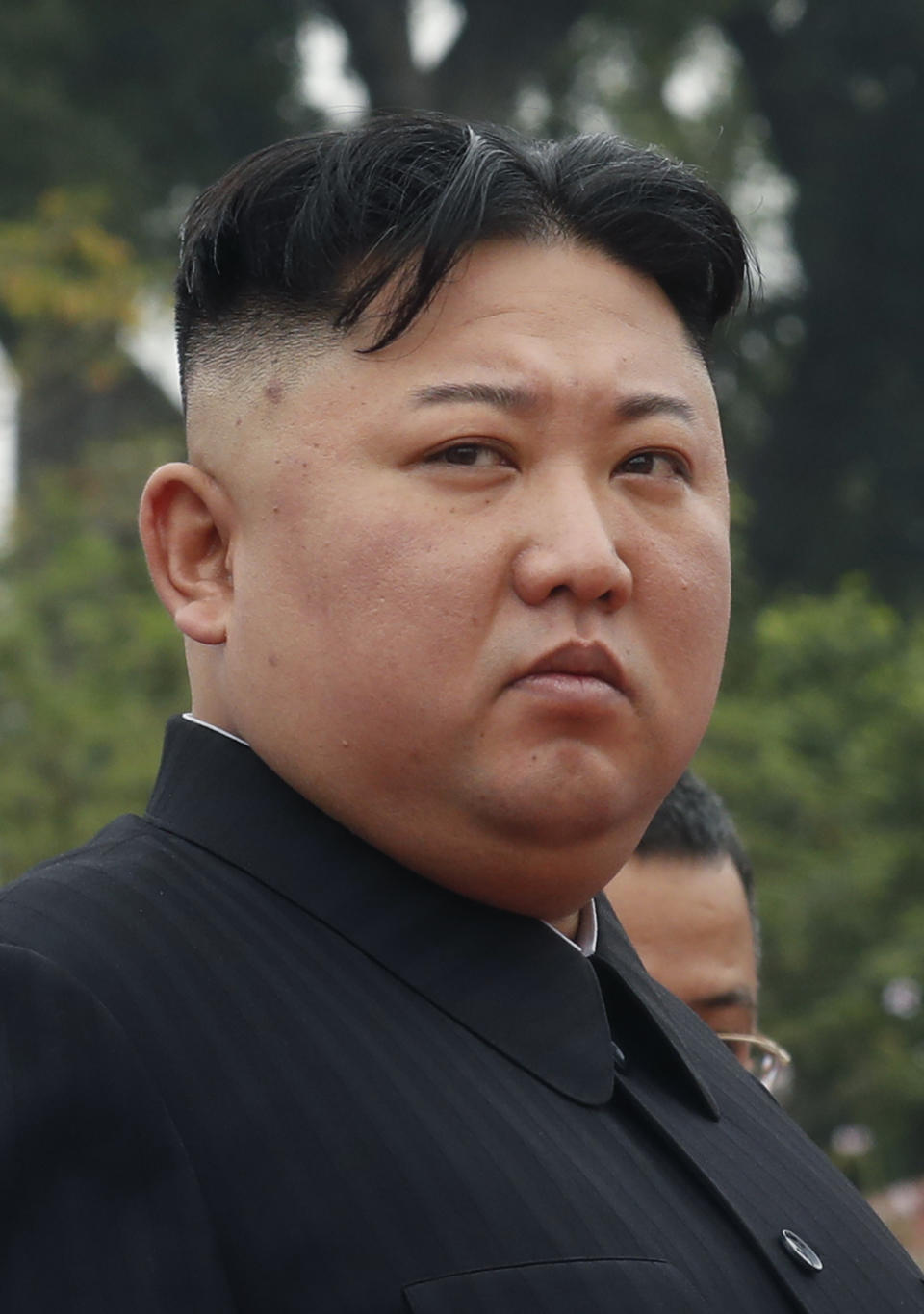 North Korean leader Kim Jong Un attends a wreath laying ceremony at Monument to War Heroes and Martyrs in Hanoi, Vietnam Saturday, March 2, 2019. (Kham/Pool Photo via AP)