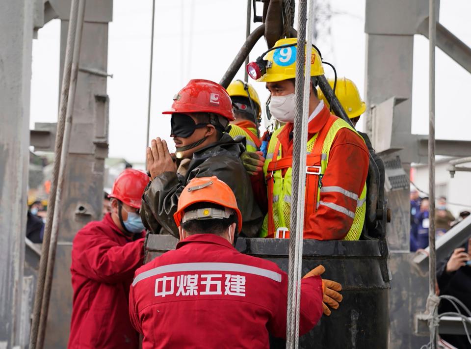 The death toll has risen to 10 after 22 Chinese miners were trapped underground (CNS/AFP via Getty Images)