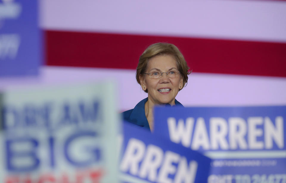 Sen. Elizabeth Warren (D-Mass.) would introduce a public option and then, after two years, ask Congress to take up Medicare for All. (Photo: Boston Globe via Getty Images)