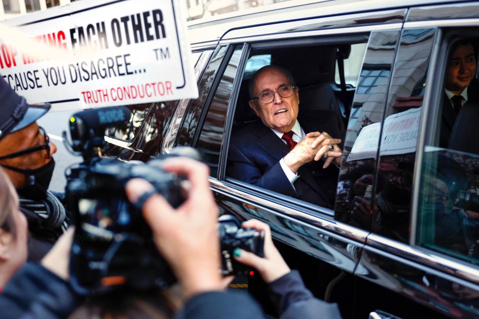 Rudy Giuliani, the former personal lawyer for former President Donald Trump, departs from the E. Barrett Prettyman U.S. District Courthouse after a verdict was reached in his defamation jury trial on Dec. 15, 2023, in Washington, D.C. A jury has ordered Giuliani to pay $148 million in damages to Fulton County election workers Ruby Freeman and Shaye Moss.