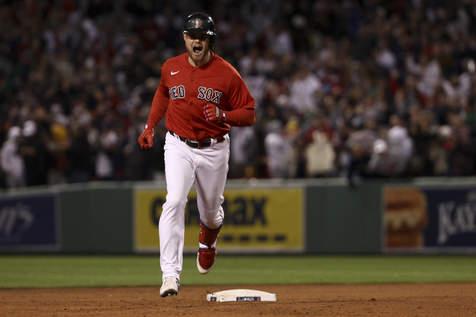 Boston Red Sox's Christian Arroyo celebrates after a two-run home run against the Houston Astros during the third inning in Game 3 of baseball's American League Championship Series Monday, Oct. 18, 2021, in Boston. (AP Photo/Winslow Townson)