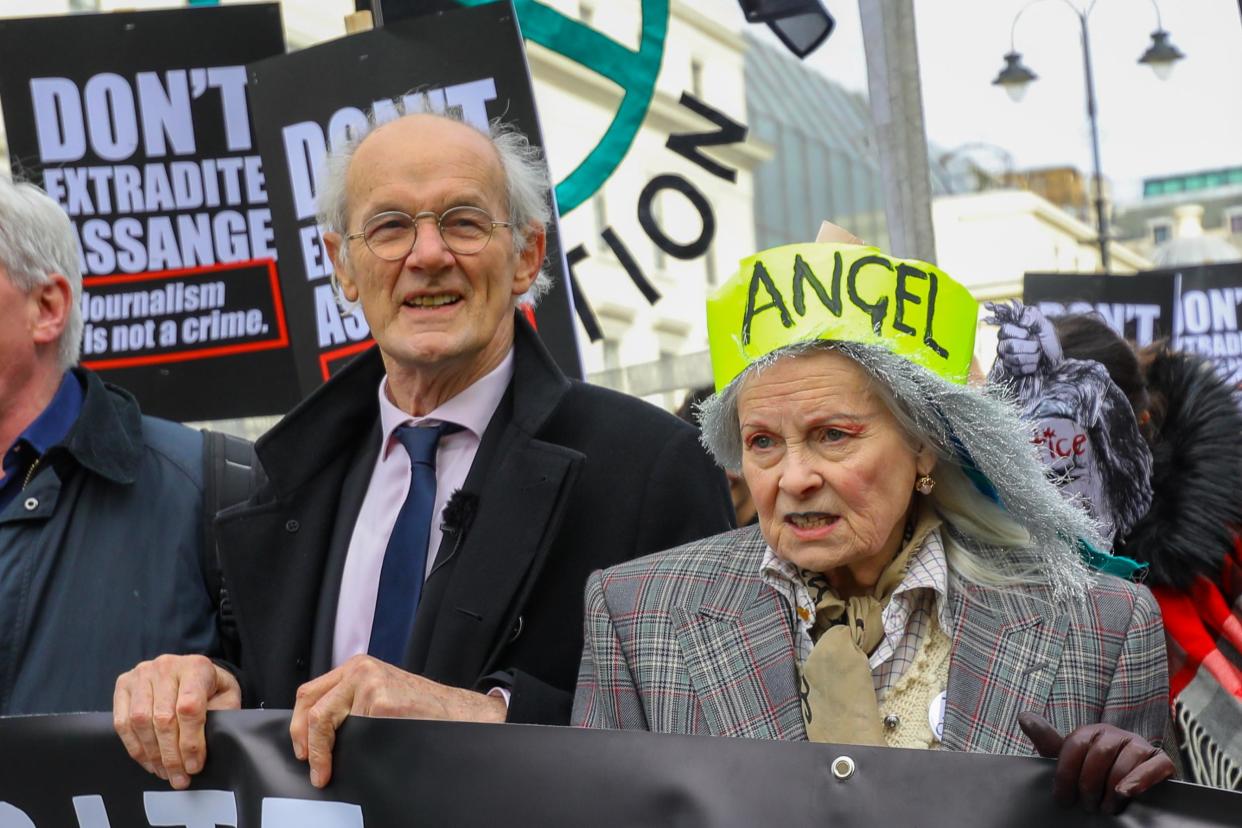 Fashion designer Vivienne Westwood (R) and Assange's Father John Shipton (L) joins protesters to take part in a 'Don't Extradite Julian Assange' protest rally: EPA