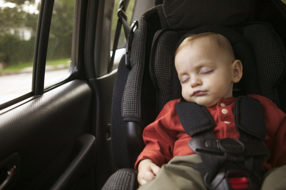 baby sleeping in the car