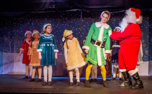 The 2017 Knoxville Children’s Theatre production of “Elf: The Musical Jr.” featured Eva Rogers, in red, and Evie Braude, in blue, as elves. Rogers is stage manager for the current production, and her younger sister Amy will play an elf. Braude, now a Webb High School senior, is the director. Nov. 2017