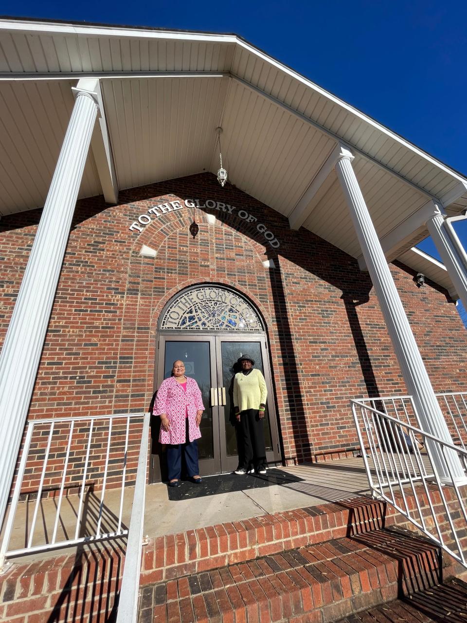 Janet Gerald, mayor, and Sharon Martin,  mayor pro tem, stand in front of Kingstown's Macedonia Baptist Church where the founding fathers decided on the name "Kingstown."