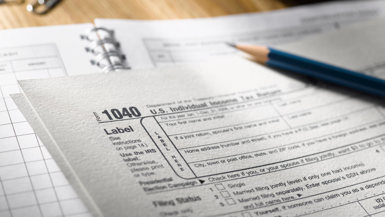 Tax form and pencil. (Jeffrey Hamilton/Getty Images)