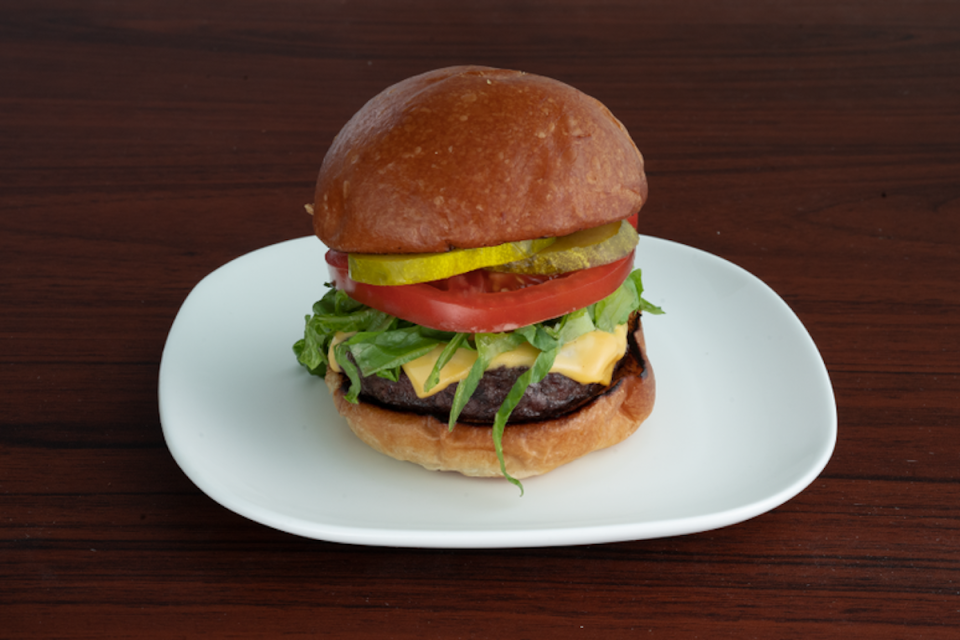 <p>The Paisanos Burger recipe comes from Barclays Center in Brooklyn, New York. It’s got all the essential fixings you’d expect <a href="https://www.thedailymeal.com/eat/best-burger-every-state-gallery?referrer=yahoo&category=beauty_food&include_utm=1&utm_medium=referral&utm_source=yahoo&utm_campaign=feed" rel="nofollow noopener" target="_blank" data-ylk="slk:on a top-notch burger;elm:context_link;itc:0;sec:content-canvas" class="link ">on a top-notch burger</a>: lettuce, tomato, pickles, mayo, ketchup, American cheese and a secret sauce.</p> <p><a href="https://www.thedailymeal.com/recipes/paisanos-butcher-burger-recipe?referrer=yahoo&category=beauty_food&include_utm=1&utm_medium=referral&utm_source=yahoo&utm_campaign=feed" rel="nofollow noopener" target="_blank" data-ylk="slk:For the Paisanos Burger Recipe, click here.;elm:context_link;itc:0;sec:content-canvas" class="link ">For the Paisanos Burger Recipe, click here.</a></p>