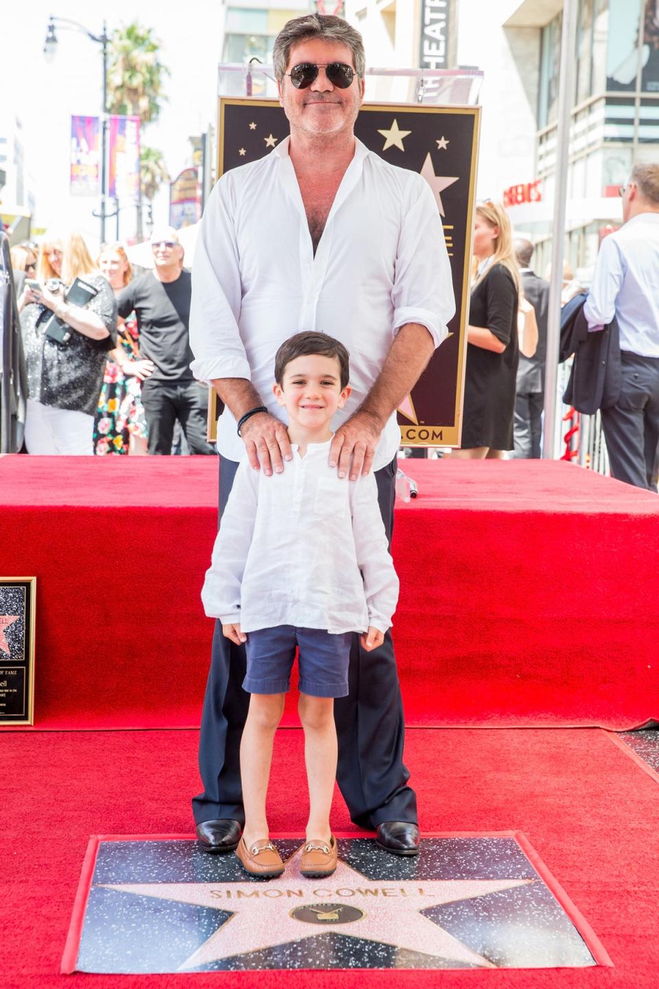 Cowell and Eric attend a ceremony honoring Cowell with a star on the Hollywood Walk of Fame in  August 2018 (Getty Images)