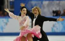 Meryl Davis and Charlie White of the U.S. compete during the Figure Skating Ice Dance Short Dance Program at the Sochi 2014 Winter Olympics, February 16 2014. REUTERS/Alexander Demianchuk