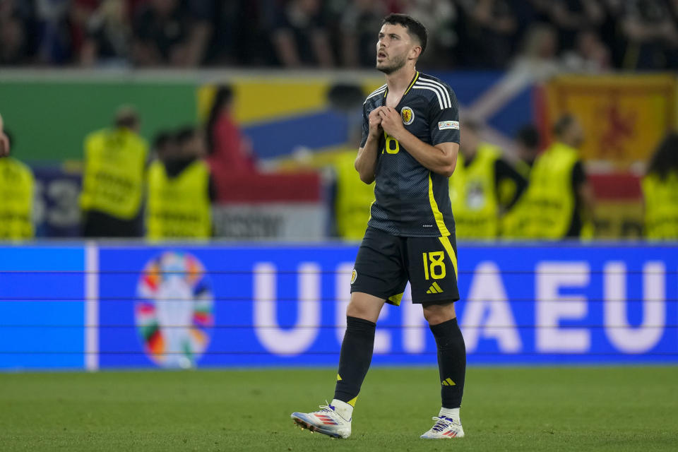 Scotland's Lewis Morgan walks on the pitch at the end of a Group A match between Scotland and Hungary at the Euro 2024 soccer tournament in Stuttgart, Germany, Sunday, June 23, 2024. (AP Photo/Matthias Schrader)